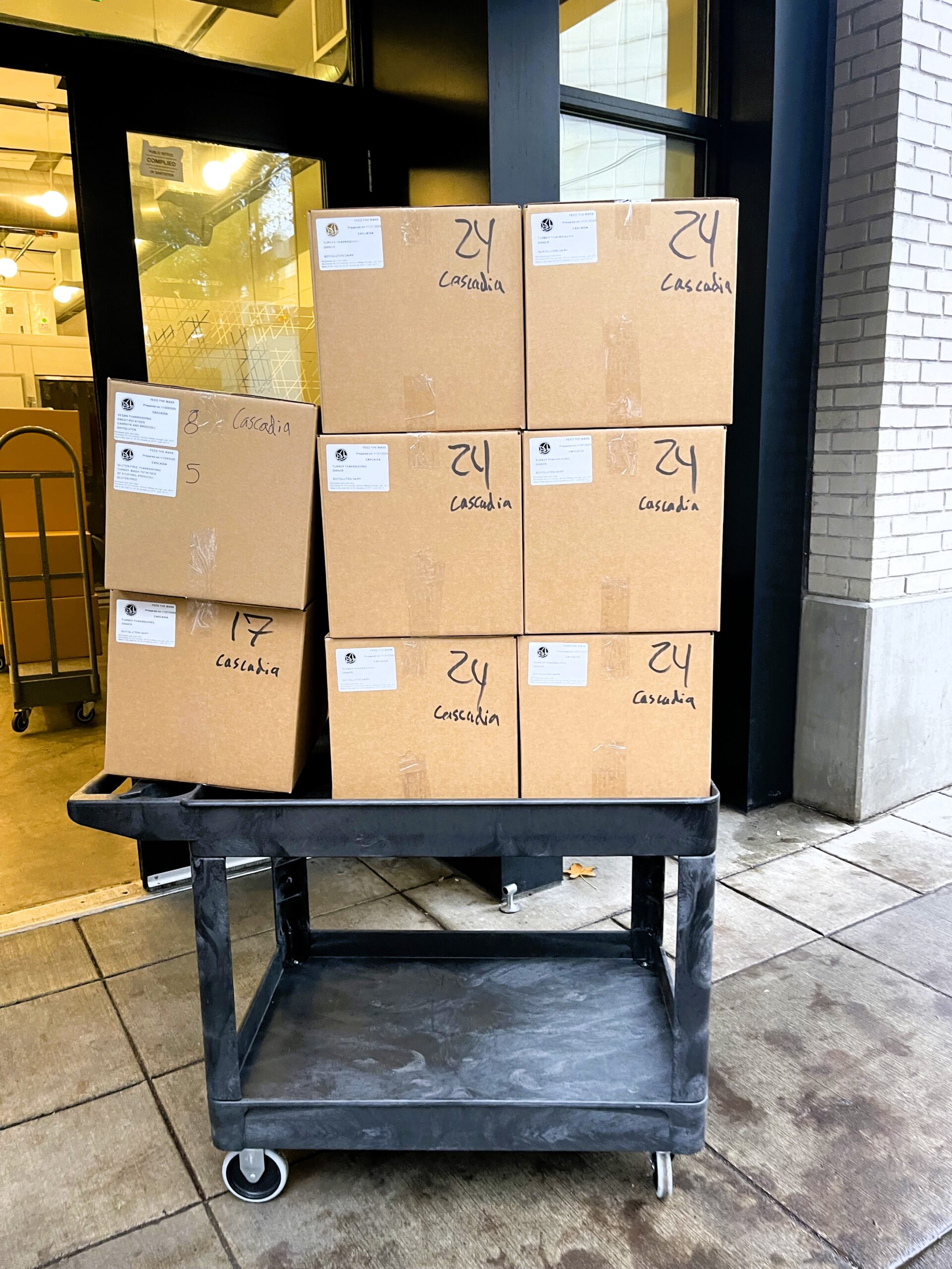 Eight boxes of meals in front of the apartment where they will be elivered